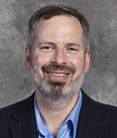 Dr. Travis Nesmith